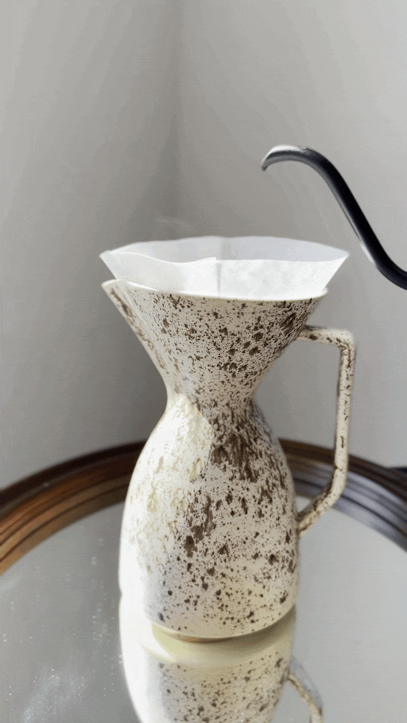 2. Slowly pour hot water